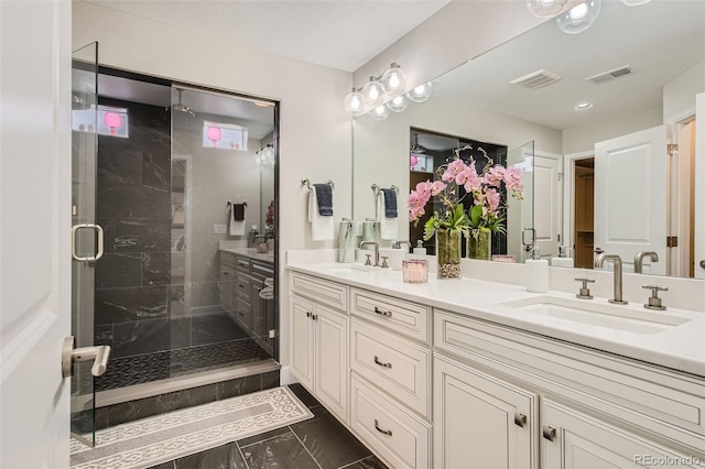 bathroom featuring vanity and walk in shower