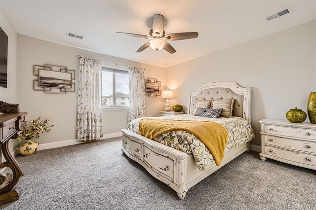 bedroom with ceiling fan and carpet