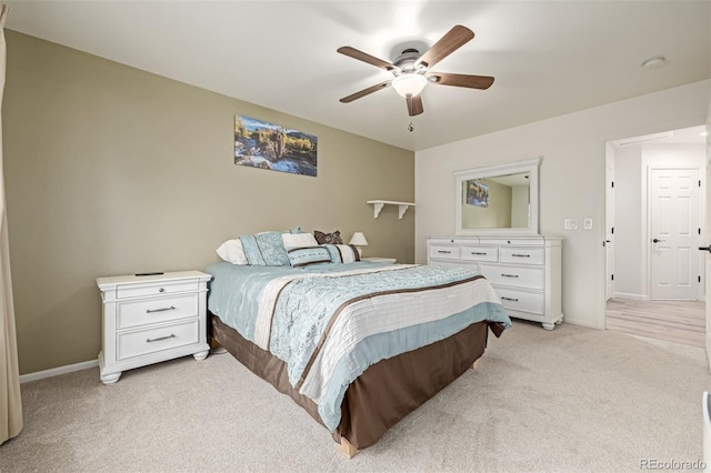 bedroom with baseboards, light colored carpet, and ceiling fan