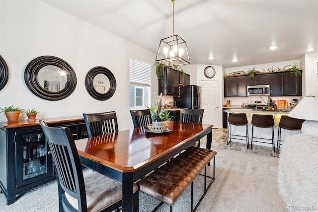 dining room featuring recessed lighting