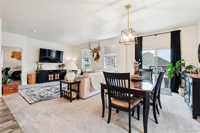 dining room featuring a chandelier