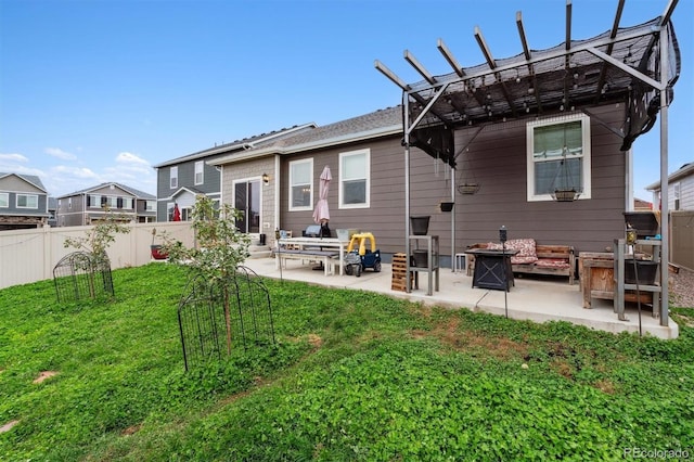 rear view of house with a patio area, fence, a pergola, and a yard