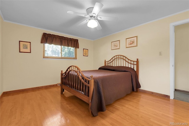 1091 E Pinewood Ave, Centennial, CO 80121 - bedroom featuring light wood-style flooring, ornamental molding, and a ceiling fan