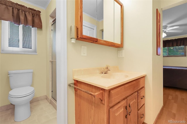 1091 E Pinewood Ave, Centennial, CO 80121 - ensuite bathroom with vanity, ornamental molding, a shower stall, and a ceiling fan