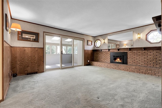 1091 E Pinewood Ave, Centennial, CO 80121 - unfurnished living room with carpet, a fireplace, and wooden walls