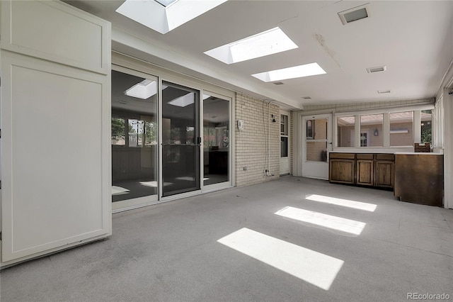 1091 E Pinewood Ave, Centennial, CO 80121 - unfurnished sunroom featuring a skylight