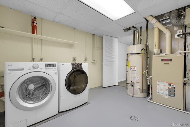 1091 E Pinewood Ave, Centennial, CO 80121 - laundry room with water heater, independent washer and dryer, and heating unit