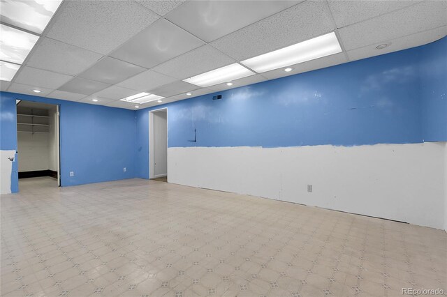 1091 E Pinewood Ave, Centennial, CO 80121 - spare room with a drop ceiling and tile patterned floors