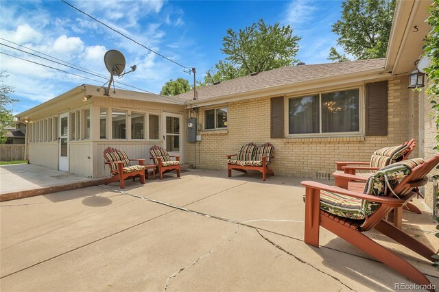 1091 E Pinewood Ave, Centennial, CO 80121 - view of patio / terrace with a sunroom