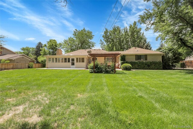 1091 E Pinewood Ave, Centennial, CO 80121 - back of house featuring a pergola and a chimney