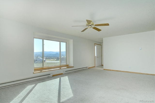 30870 County Road 356, Buena Vista, CO 81211 - unfurnished room featuring a baseboard radiator, carpet, and ceiling fan
