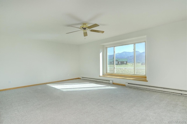 30870 County Road 356, Buena Vista, CO 81211 - carpeted empty room featuring a baseboard radiator and a ceiling fan