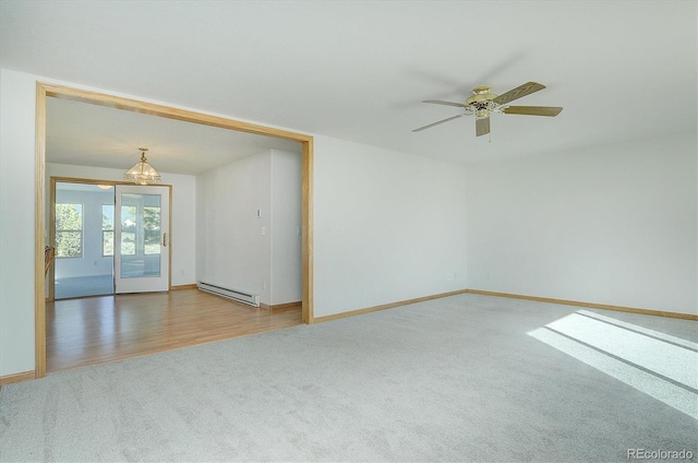 30870 County Road 356, Buena Vista, CO 81211 - spare room with carpet, a baseboard heating unit, and ceiling fan