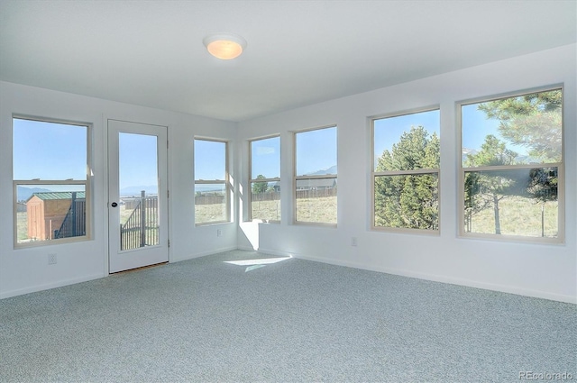 30870 County Road 356, Buena Vista, CO 81211 - unfurnished sunroom with carpet and healthy amount of natural light