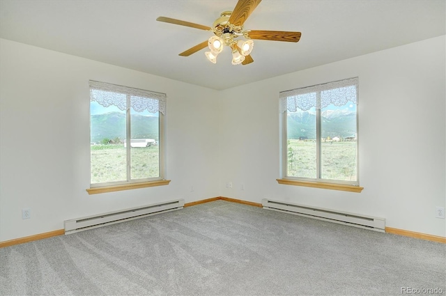 30870 County Road 356, Buena Vista, CO 81211 - unfurnished room with a baseboard radiator, plenty of natural light, and carpet