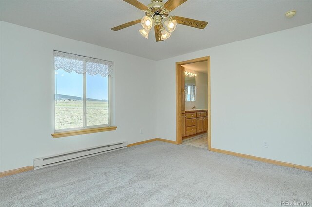 30870 County Road 356, Buena Vista, CO 81211 - empty room featuring a baseboard radiator, a smoke detector, light colored carpet, and ceiling fan