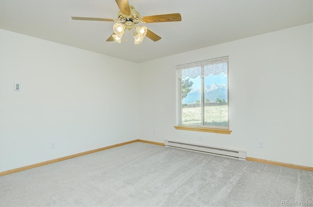 30870 County Road 356, Buena Vista, CO 81211 - spare room with baseboard heating, carpet floors, and a ceiling fan