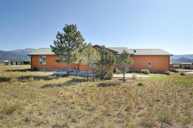 30870 County Road 356, Buena Vista, CO 81211 - back of house featuring a mountain view and a metal roof