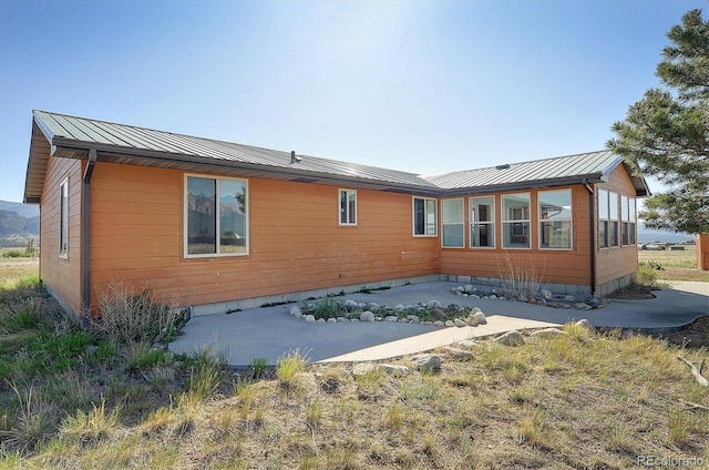 30870 County Road 356, Buena Vista, CO 81211 - view of home's exterior featuring a standing seam roof and a metal roof