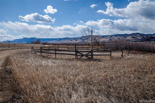 property view of mountains featuring a rural view