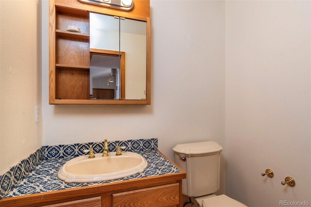 8602 N 39th St, Longmont, CO 80503 - half bath featuring vanity and toilet