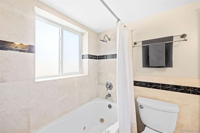 2047 S Milwaukee St Unit 4, Denver, CO 80210 - full bath with tile walls, toilet, and a combined bath / shower with jetted tub