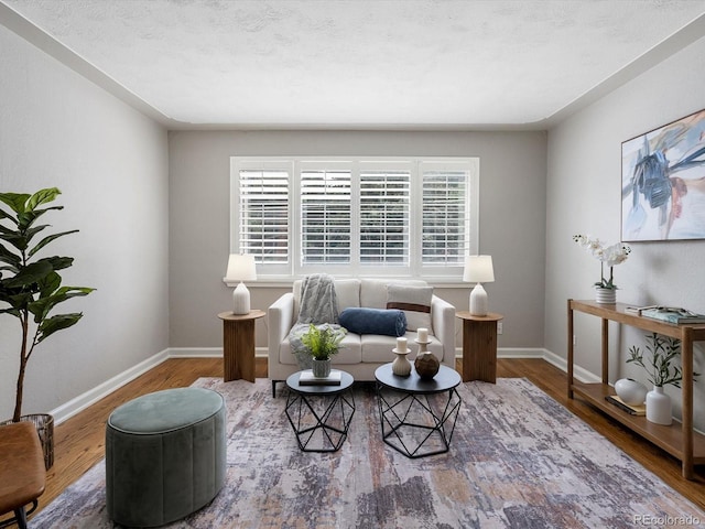 2047 S Milwaukee St Unit 4, Denver, CO 80210 - sitting room featuring wood finished floors and baseboards