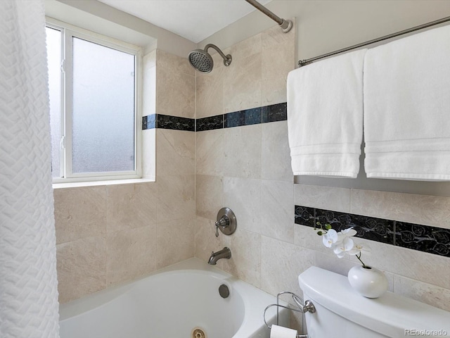 2047 S Milwaukee St Unit 4, Denver, CO 80210 - bathroom featuring a combined bath / shower with jetted tub and toilet