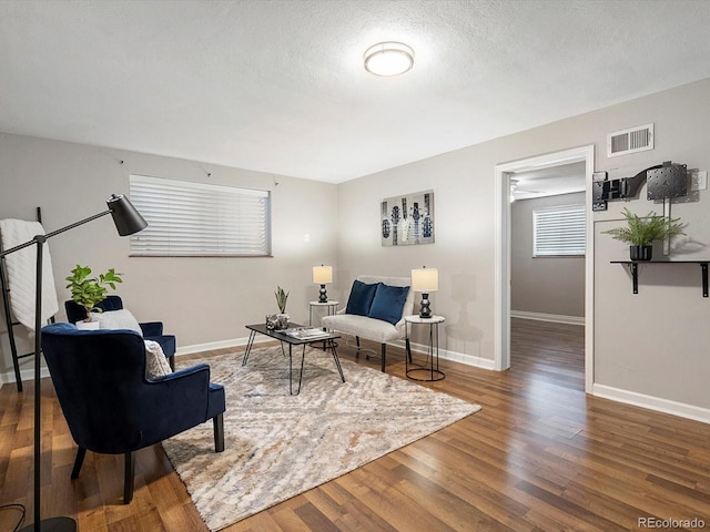 2047 S Milwaukee St Unit 4, Denver, CO 80210 - living area with baseboards and wood finished floors