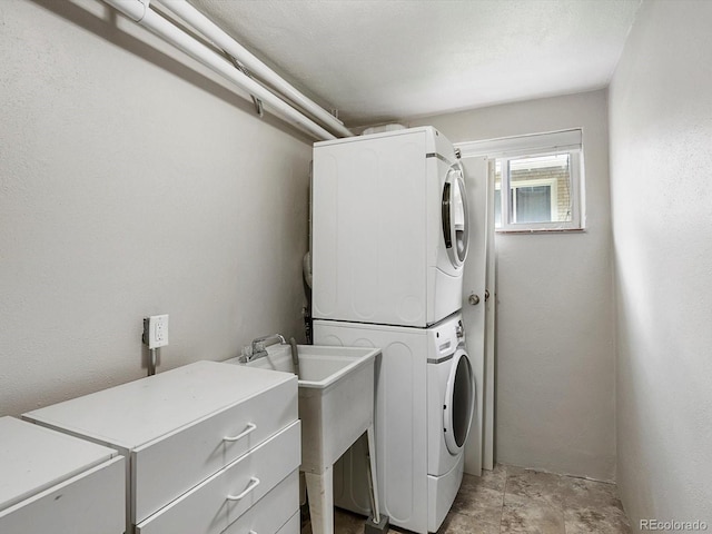 2047 S Milwaukee St Unit 4, Denver, CO 80210 - laundry area featuring stacked washing machine and dryer