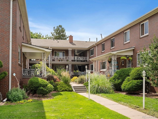 2047 S Milwaukee St Unit 4, Denver, CO 80210 - view of home's community featuring a yard