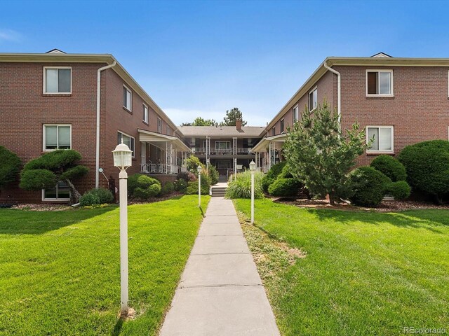 2047 S Milwaukee St Unit 4, Denver, CO 80210 - view of home's community featuring a lawn