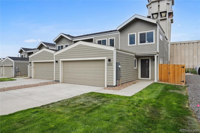 view of front facade featuring a garage and a front yard