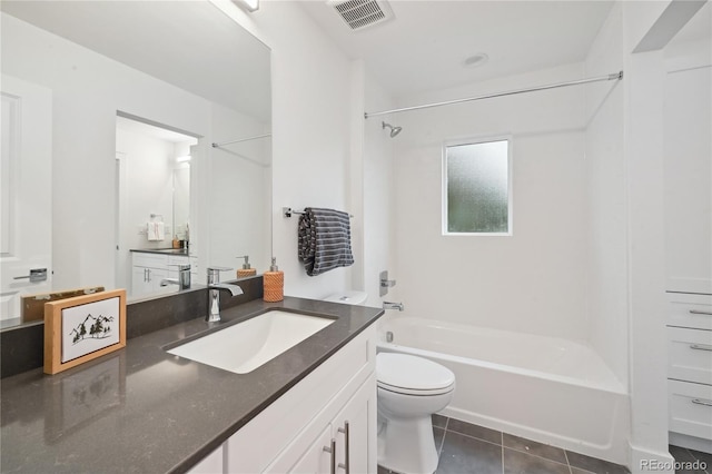 full bathroom featuring shower / bathing tub combination, tile patterned floors, vanity, and toilet