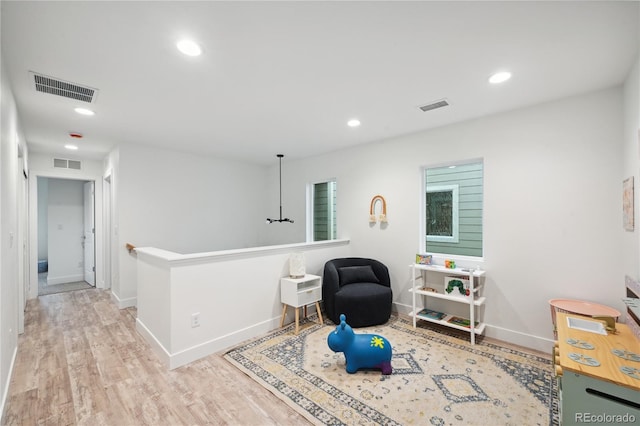 living area featuring light hardwood / wood-style flooring