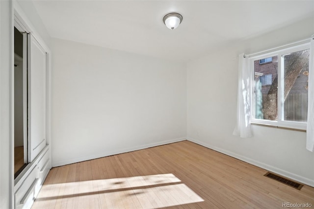 unfurnished bedroom with light hardwood / wood-style floors