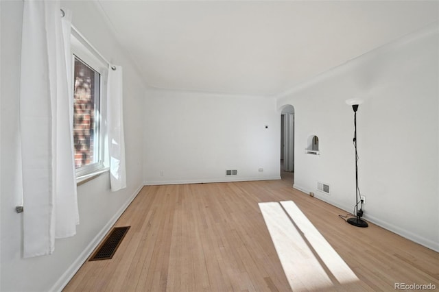 empty room with light wood-type flooring