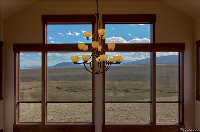 room details featuring an inviting chandelier and a mountain view