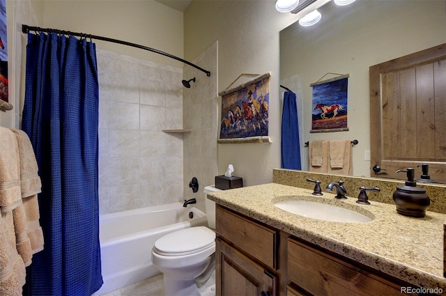 full bathroom with toilet, vanity, and shower / bath combination with curtain