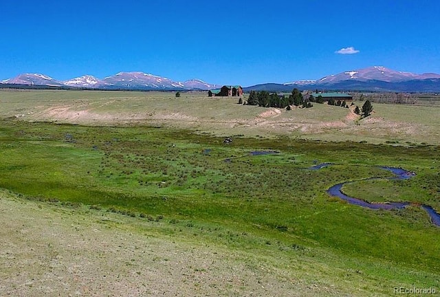 view of mountain feature with a rural view