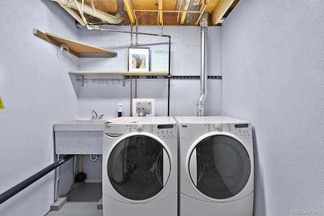 laundry area with washer and dryer and laundry area