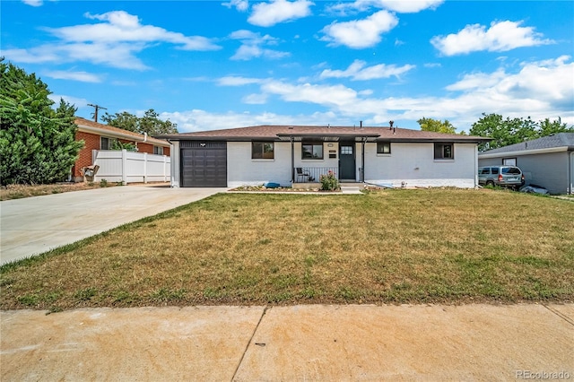 7150 Beach St, Westminster, CO 80030 - ranch-style home with driveway, an attached garage, and brick siding