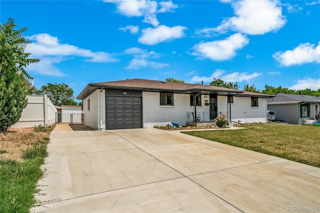 7150 Beach St, Westminster, CO 80030 - ranch-style home with driveway, a porch, a garage, and a gate