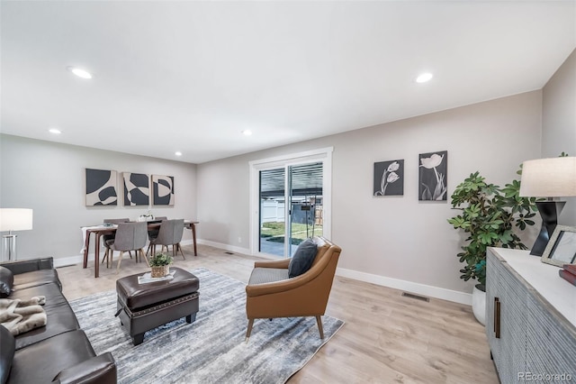 7150 Beach St, Westminster, CO 80030 - living room featuring recessed lighting and light wood-style flooring