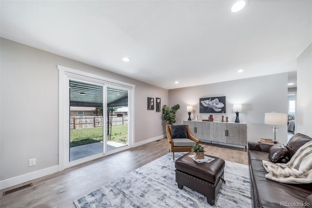 7150 Beach St, Westminster, CO 80030 - living area featuring wood finished floors and recessed lighting