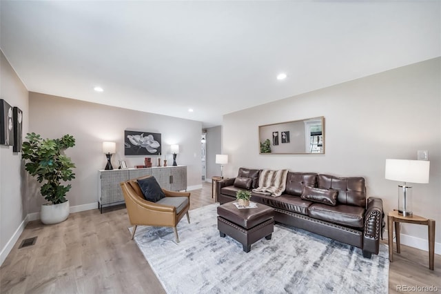 7150 Beach St, Westminster, CO 80030 - living room with light wood-type flooring and recessed lighting