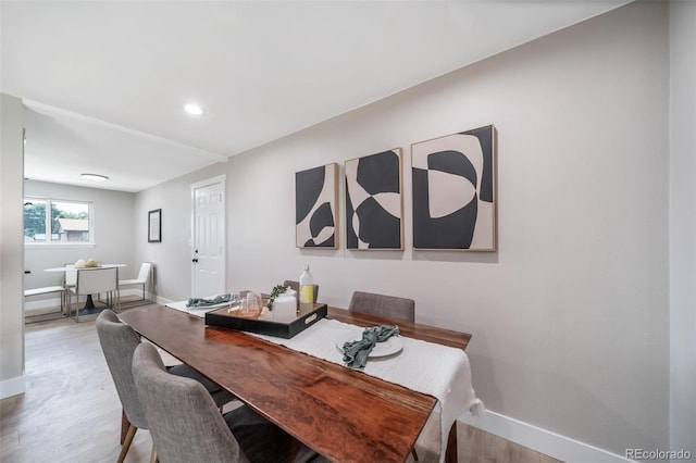 7150 Beach St, Westminster, CO 80030 - dining space with wood finished floors and recessed lighting