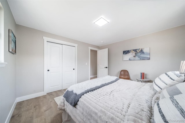 7150 Beach St, Westminster, CO 80030 - bedroom with light wood-style floors and a closet