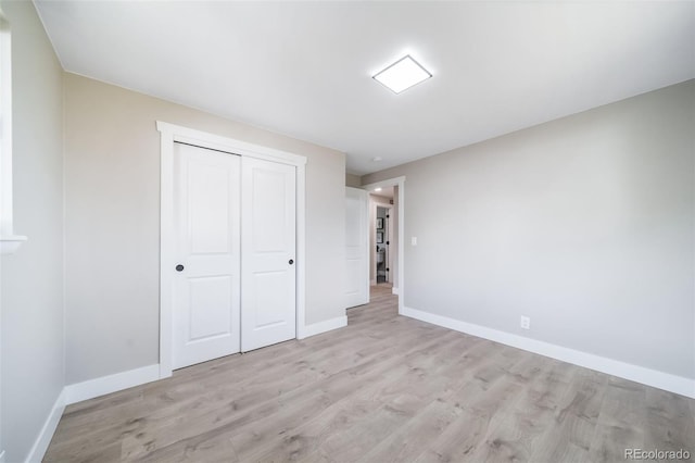 7150 Beach St, Westminster, CO 80030 - unfurnished bedroom featuring light wood-style flooring and a closet