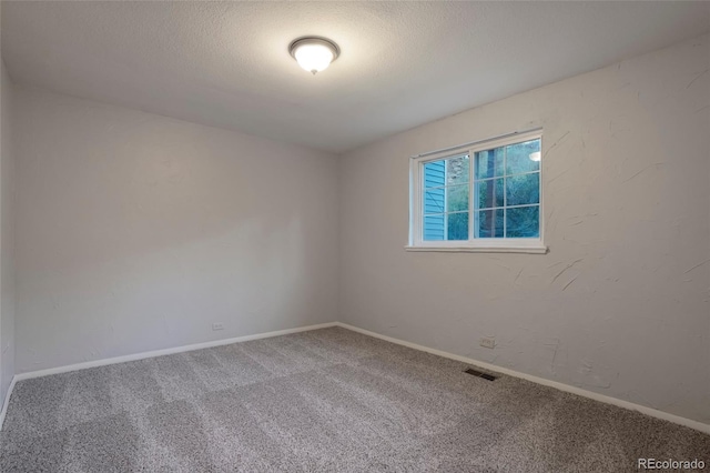 empty room with carpet floors